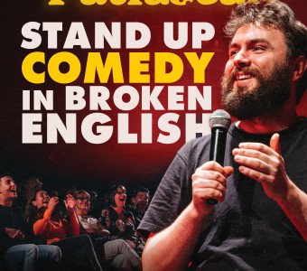 zdjęcie mężczyzny, broda, mikrofon, mowa. Napis "Victor Patrascan, stand up comedy in broken english" 